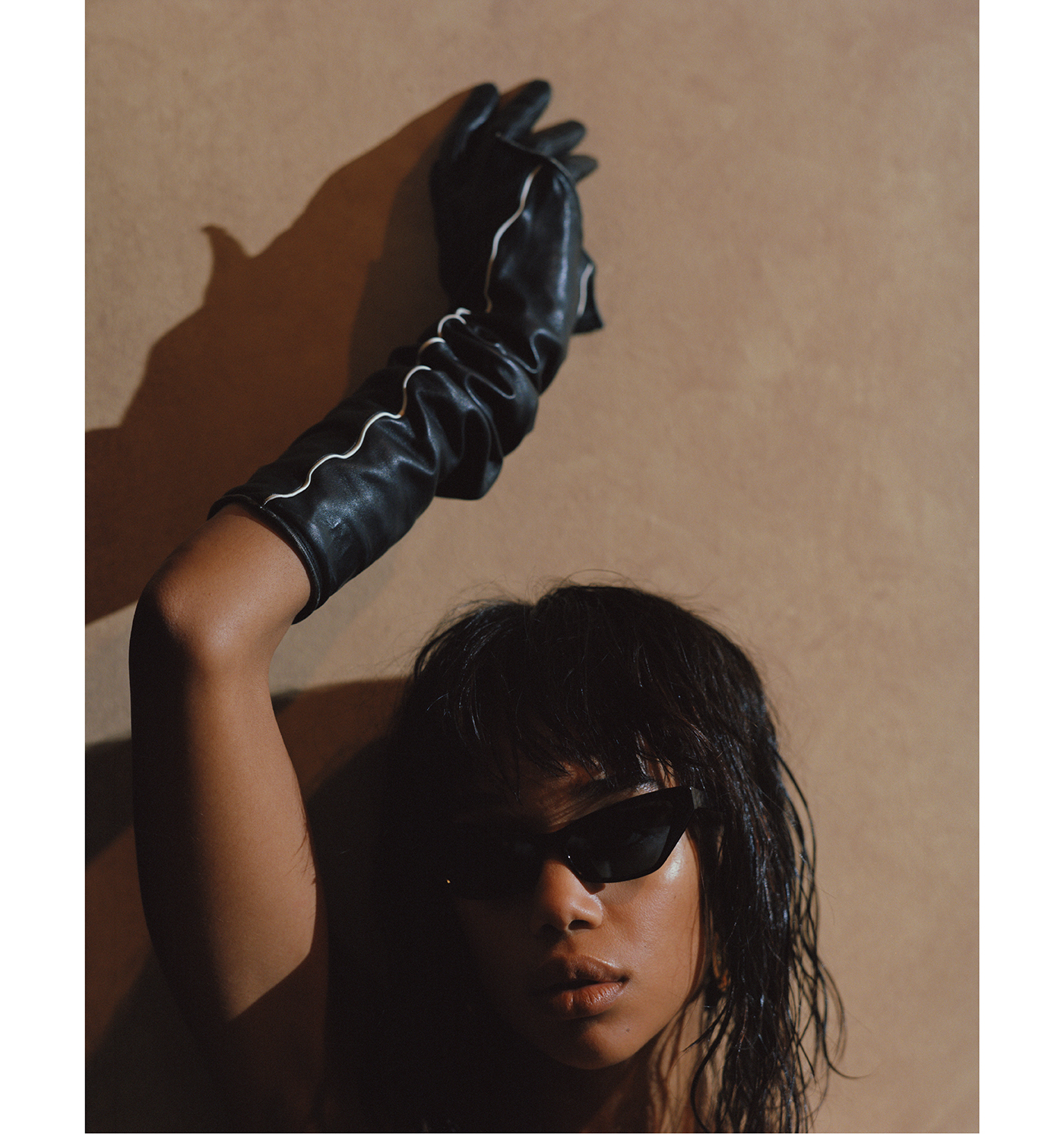 Sunglasses by Alain Mikli. Glove by Louis Vuitton.